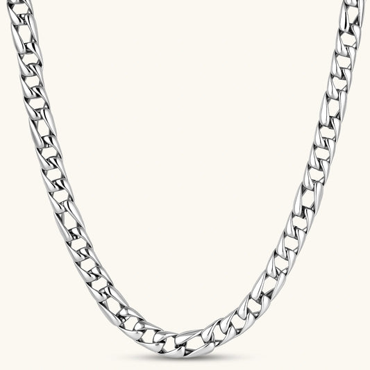 Chunky antique silver plated eco-brass curb chain necklace with a lobster clasp and Greek key detail on a cream background.